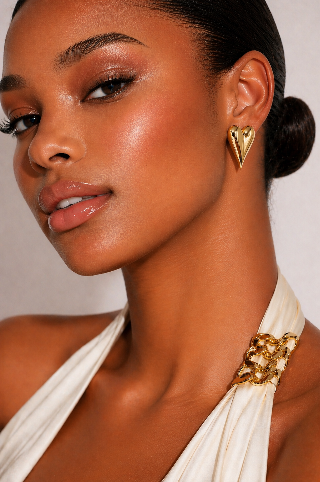 Model wearing Fendleigh Laurelle Kira heart stud earrings beauty portrait