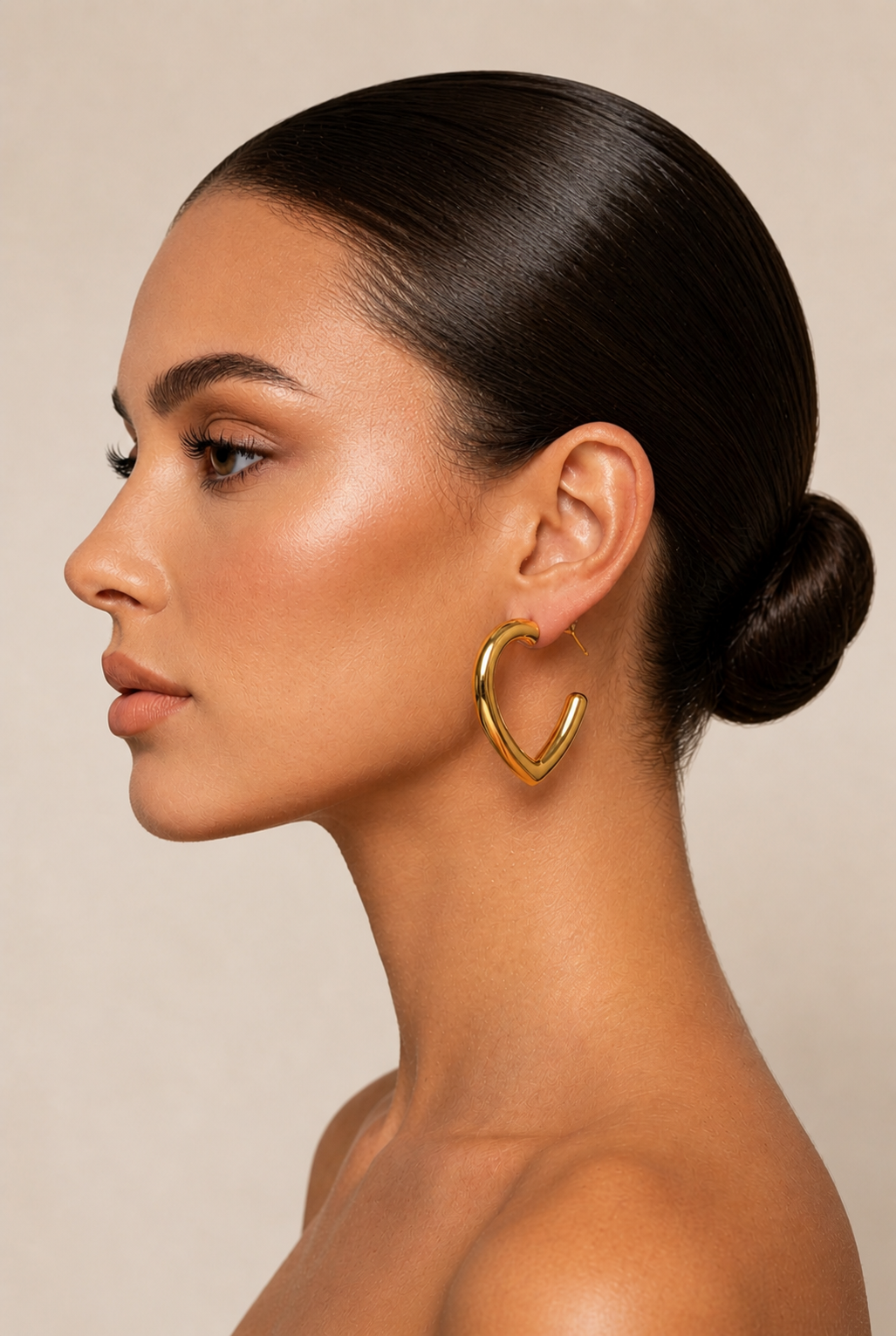 Model wearing Fendleigh Laurelle Kiran Heart earrings lifestyle shot